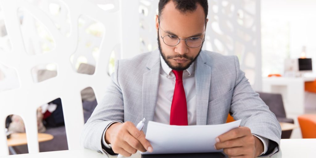 Attorney reviewing a property deed and legal description