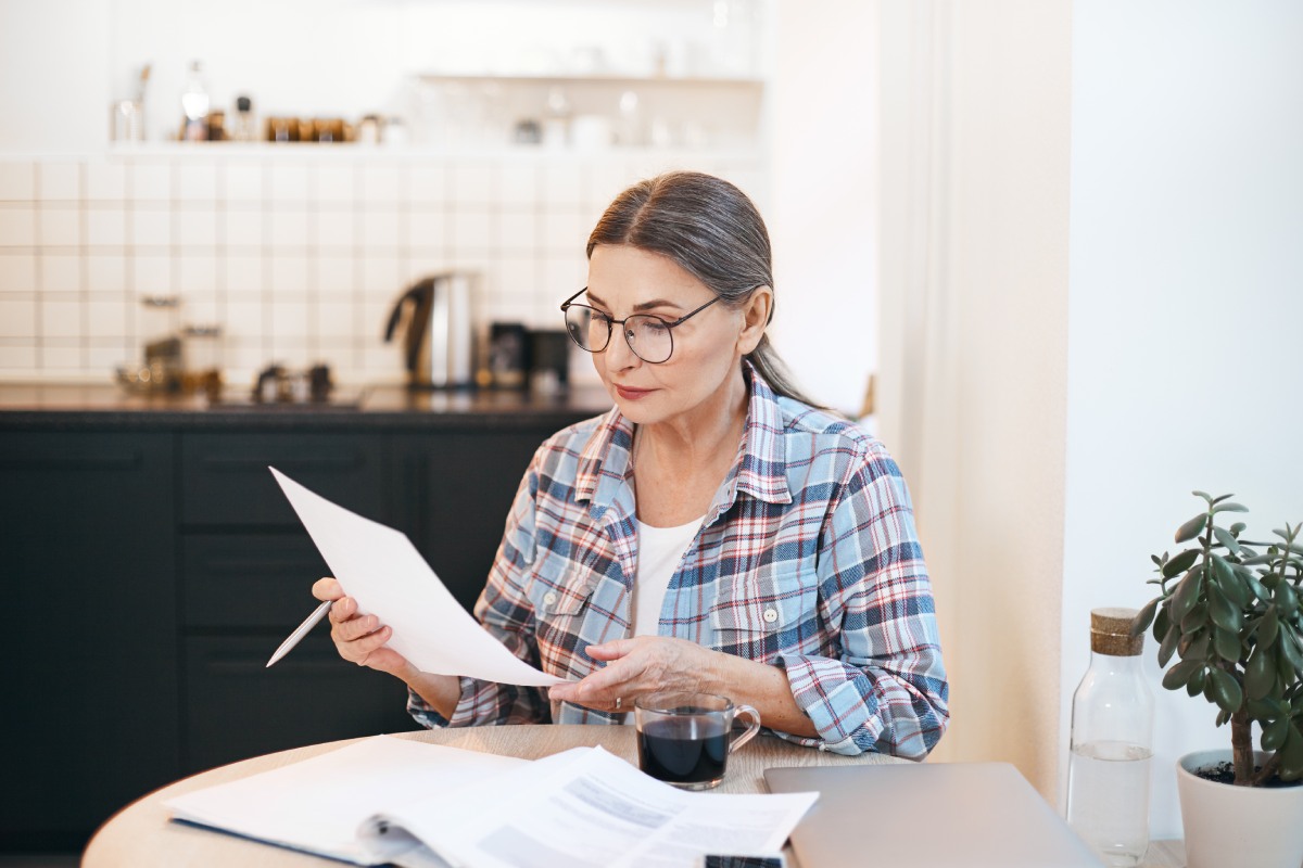 Las Vegas homeowner reviewing contractor payment documents and mechanic's lien notice