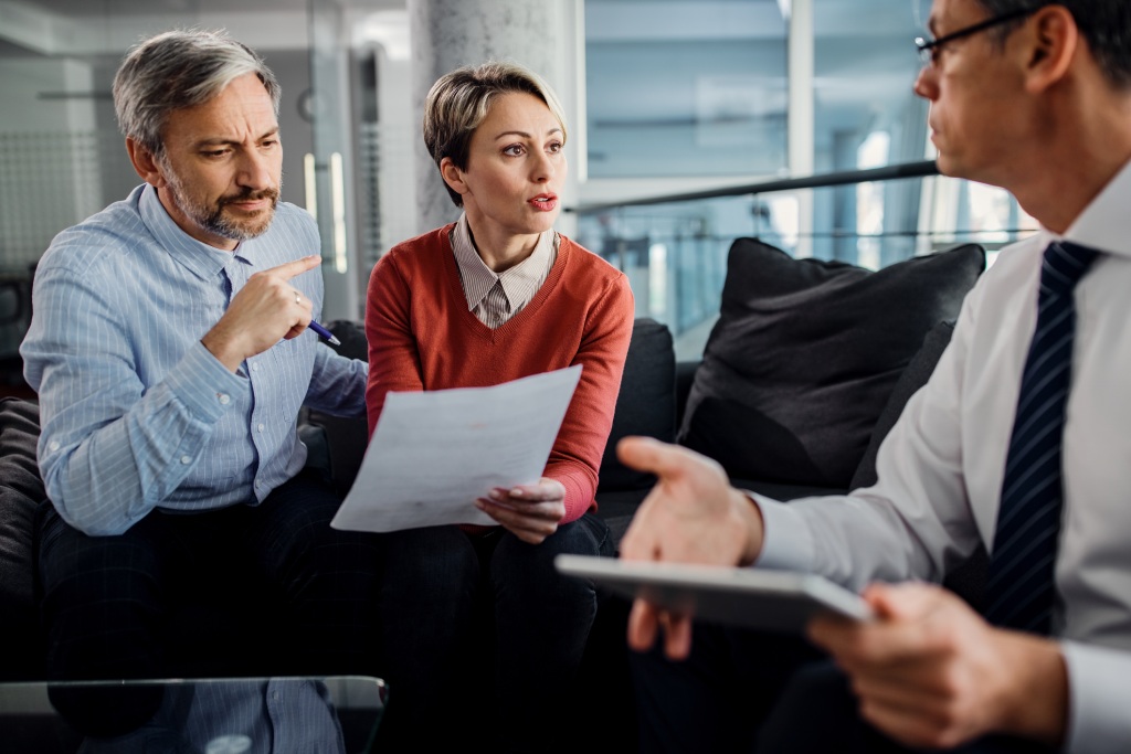 Reno property owners discussing joint tenancy and tenants in common with an attorney