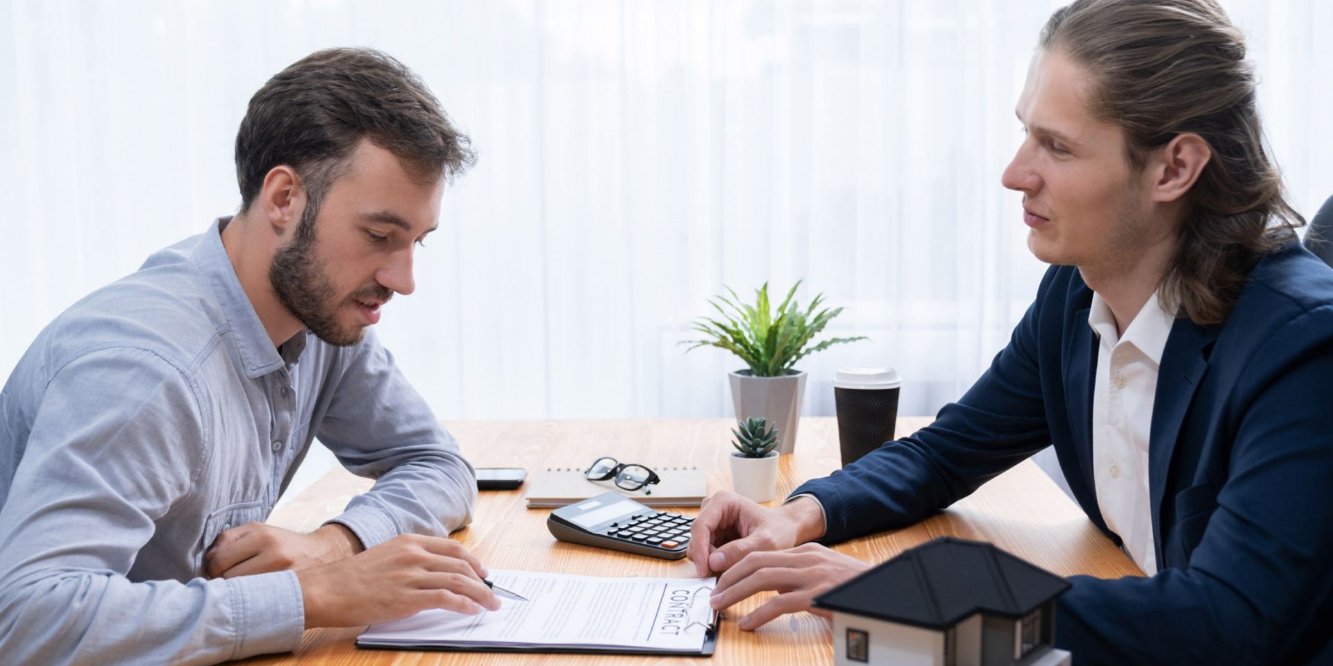 Las Vegas property owner reviewing zoning regulations with a real estate attorney
