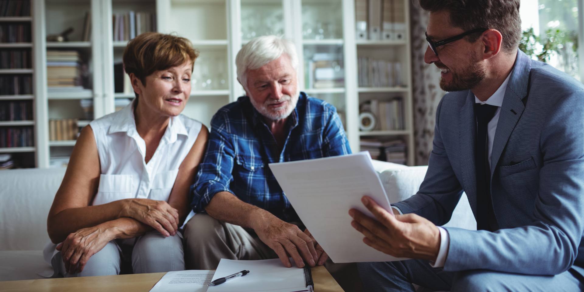 family reviewing a rent-to-own home agreement with a Nevada real estate attorney