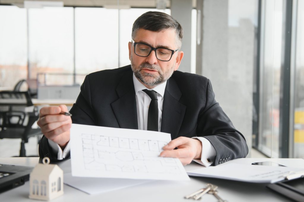 Nevada construction defect attorney reviewing building records and a potential builder claim