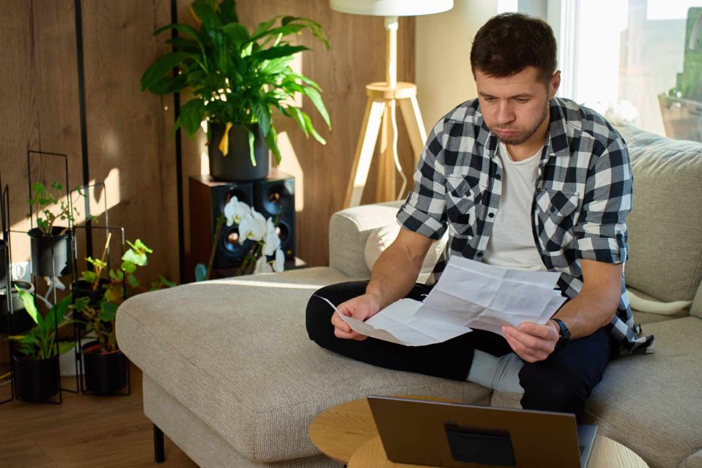 Las Vegas homeowner reviewing property title documents after discovering a title defect