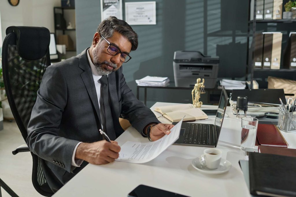 Nevada real estate attorney reviewing title insurance documents and property records
