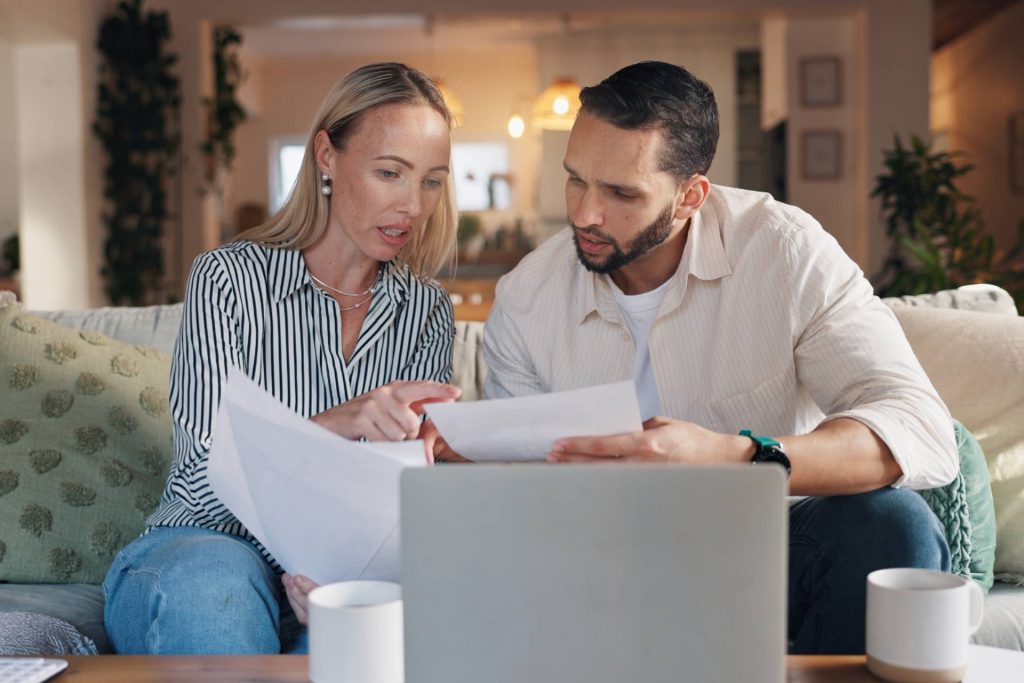 Homeowner reviewing a foreclosure surplus fund recovery agreement in Nevada