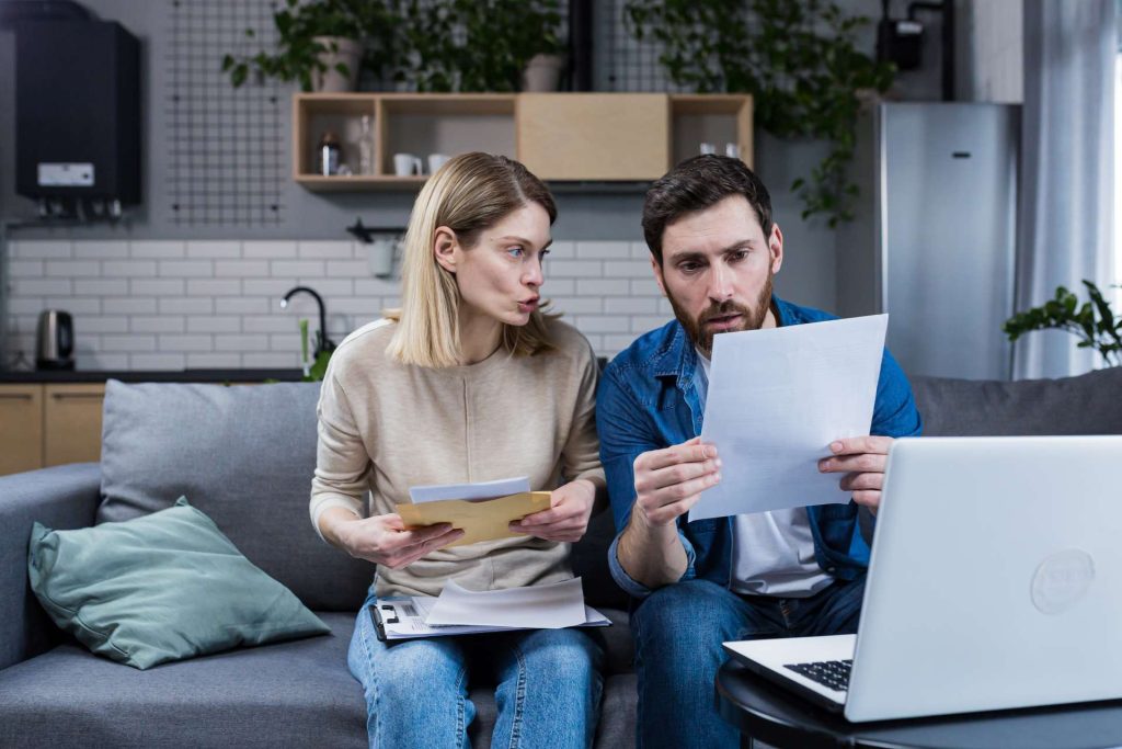 Nevada homeowner reviewing foreclosure fraud warning signs and legal documents