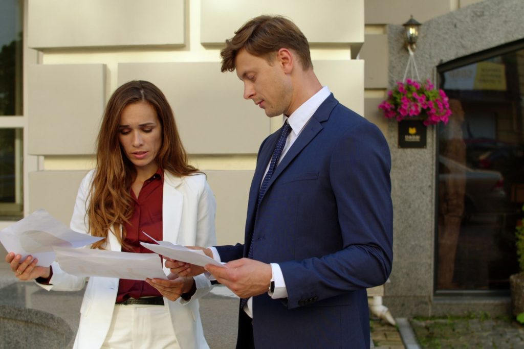Buyer and seller reviewing a Nevada real property disclosure form