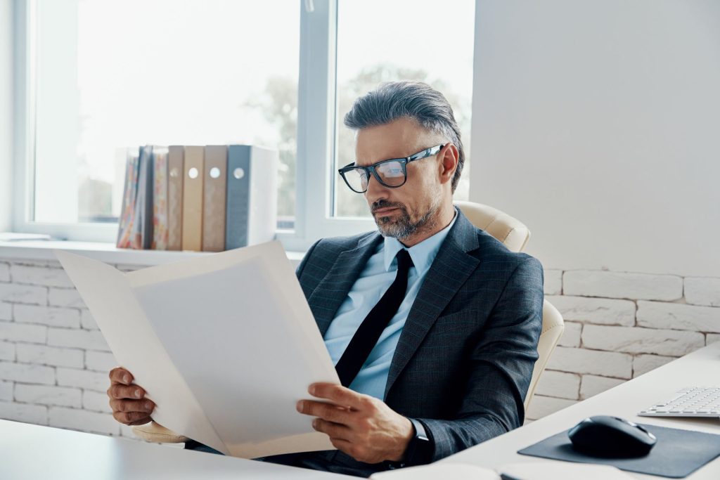 Attorney reviewing documents for a Nevada commercial lease dispute