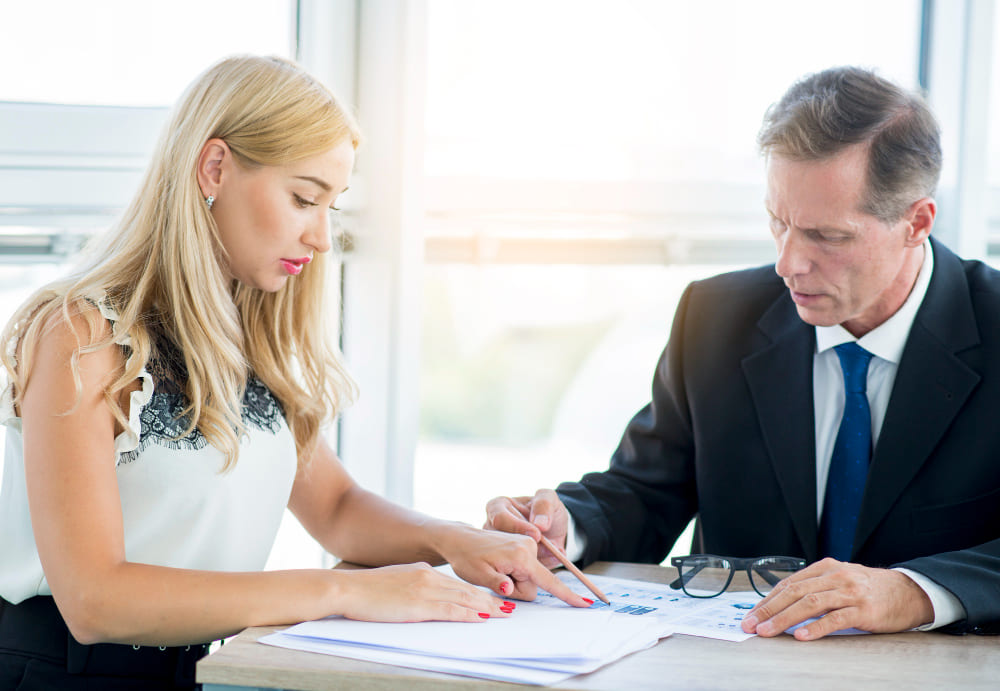 client reviewing a written fee agreement from a Nevada real estate attorney
