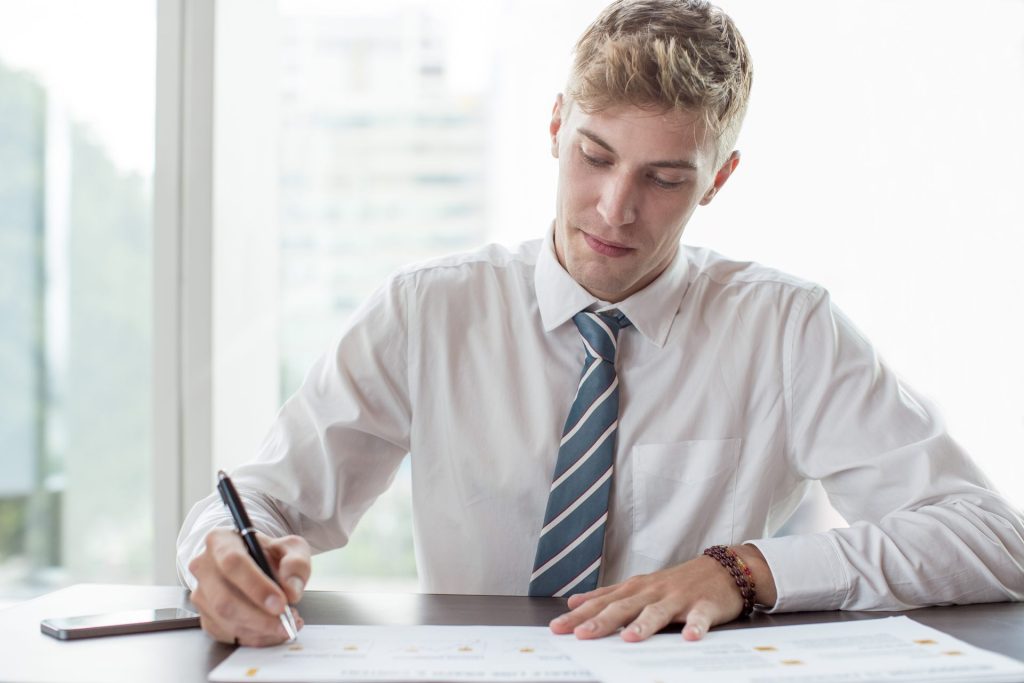 Nevada real estate investor reviewing contractual assignment terms before closing