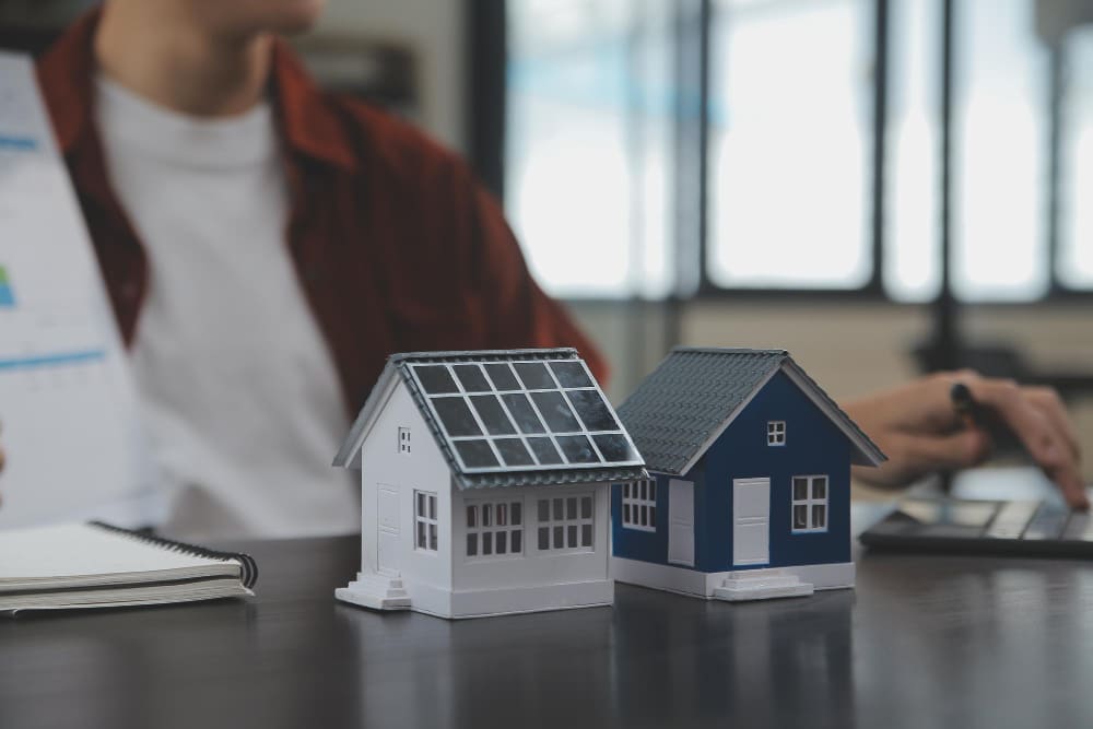 Nevada homeowner comparing a solar contract cover page with the installed system
solar panel attorney near me