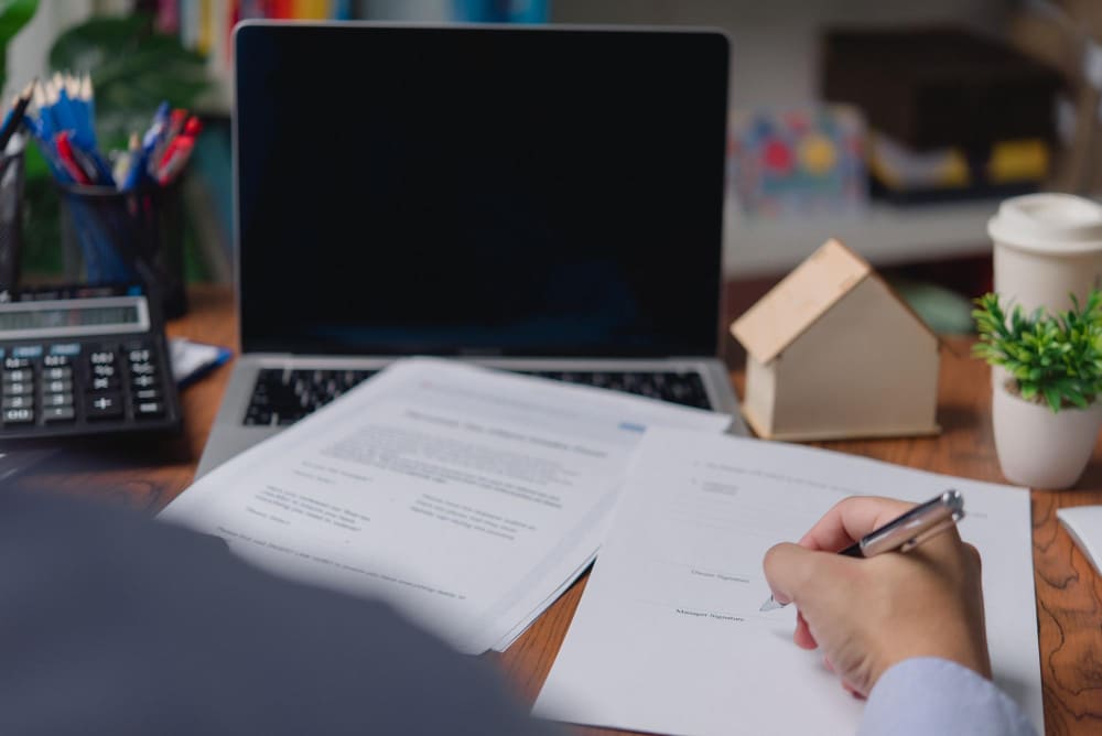 Nevada seller disclosure form and preliminary title report on a desk