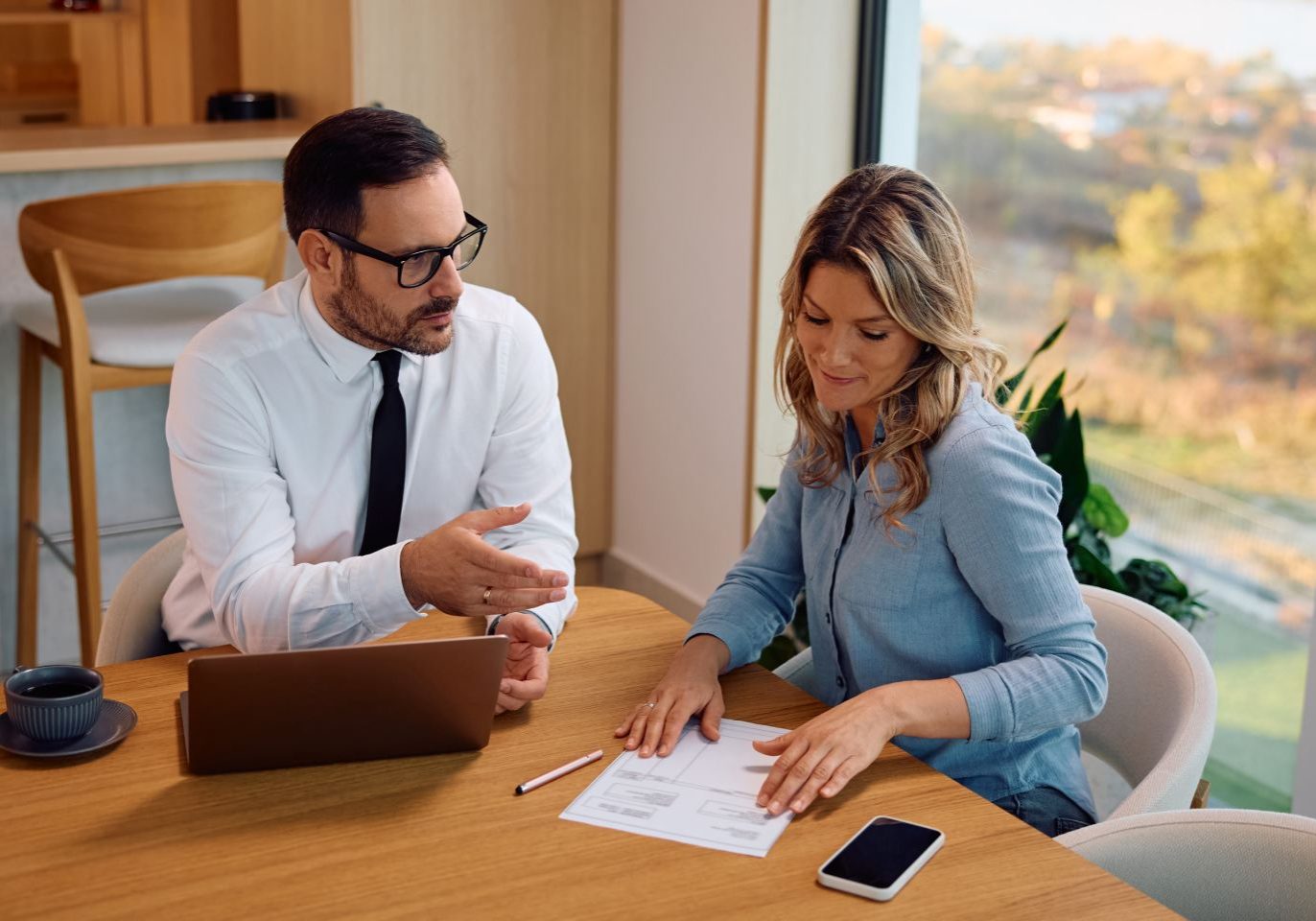 Nevada tenant reviewing an apartment lease agreement with a real estate attorney