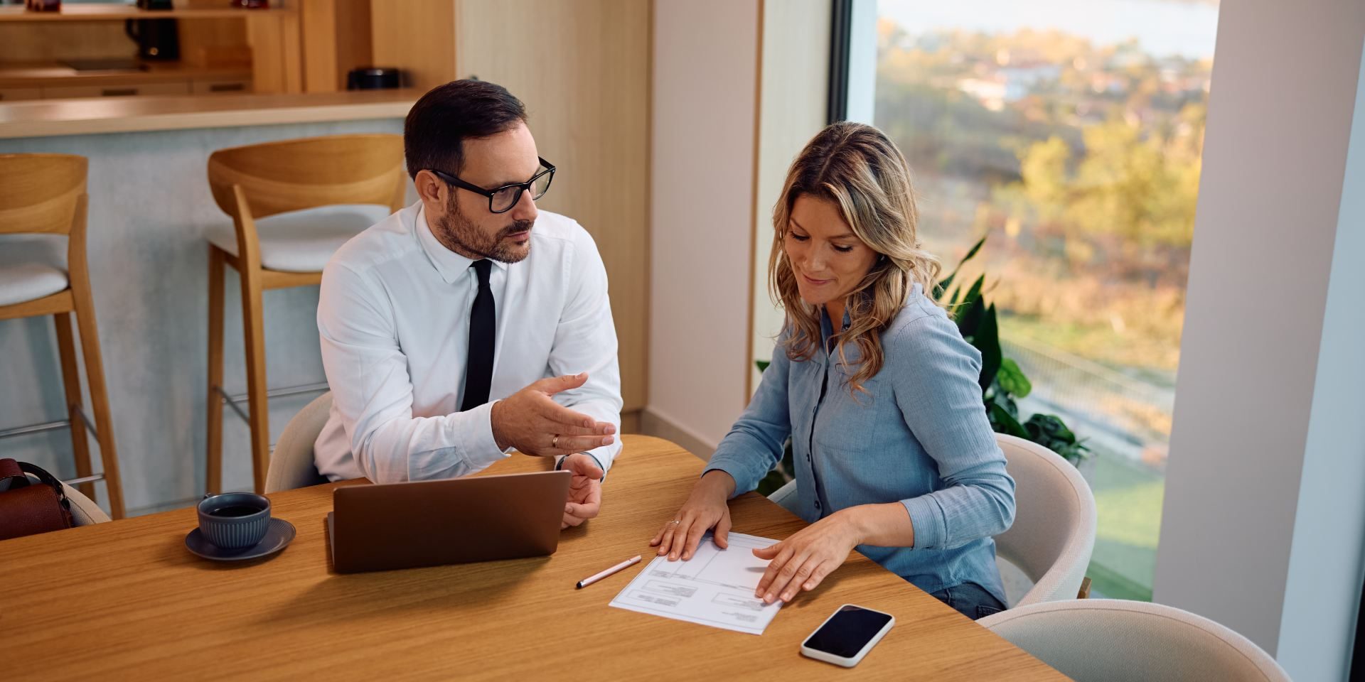 Nevada tenant reviewing an apartment lease agreement with a real estate attorney