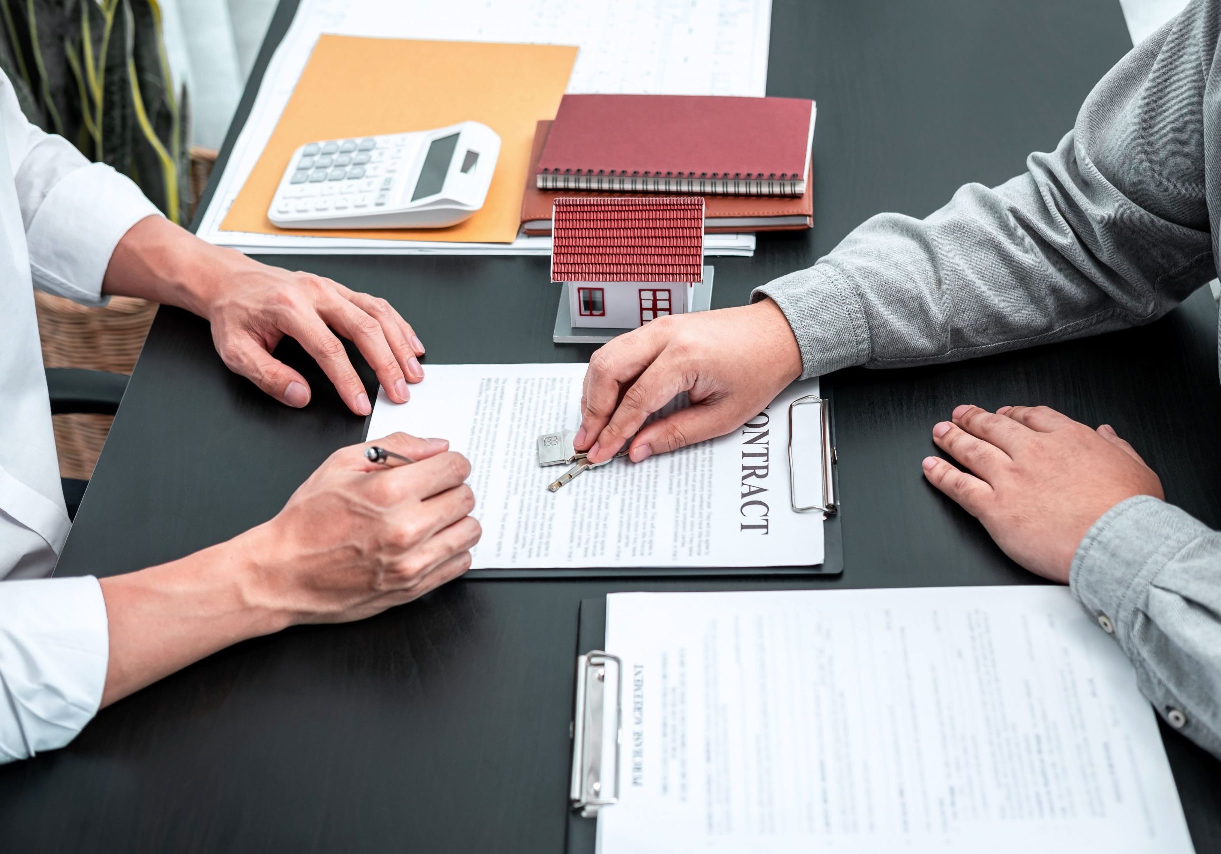 Commercial landlord and business tenant reviewing a lease lockout dispute
