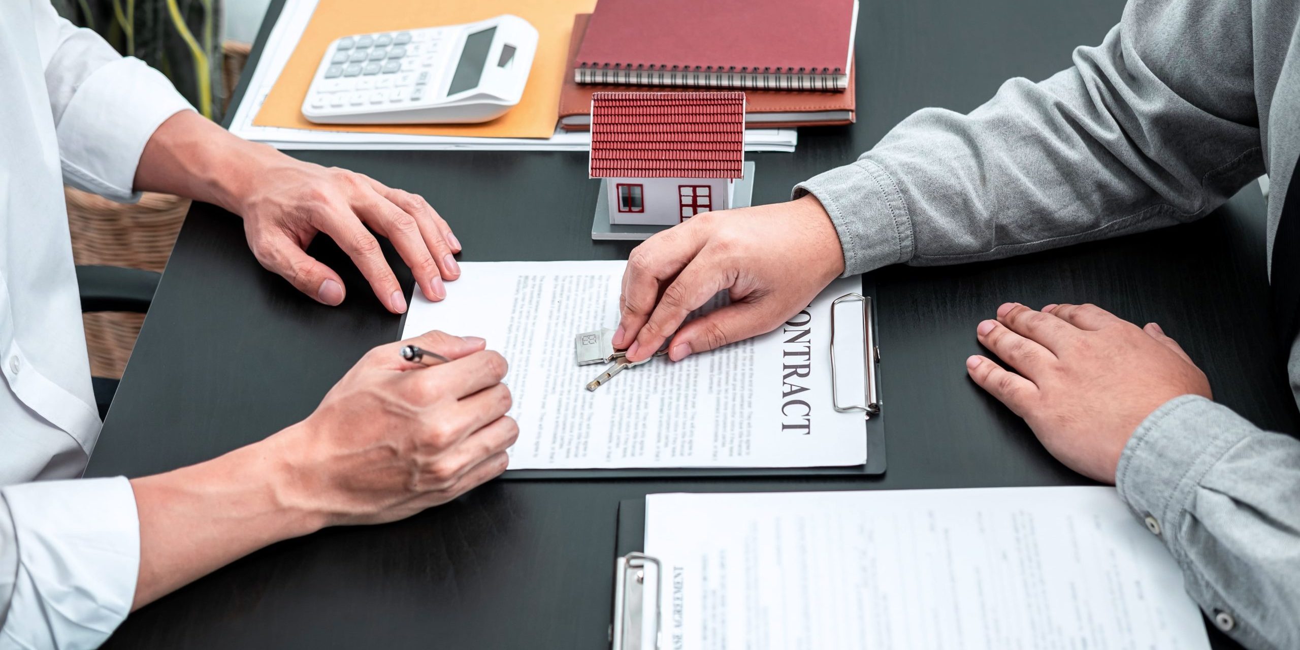 Commercial landlord and business tenant reviewing a lease lockout dispute