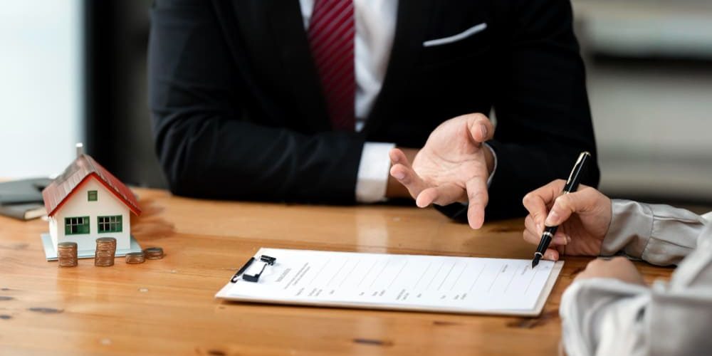 property owner meeting with a real estate lawyer in Nevada to review a contract real estate lawyer