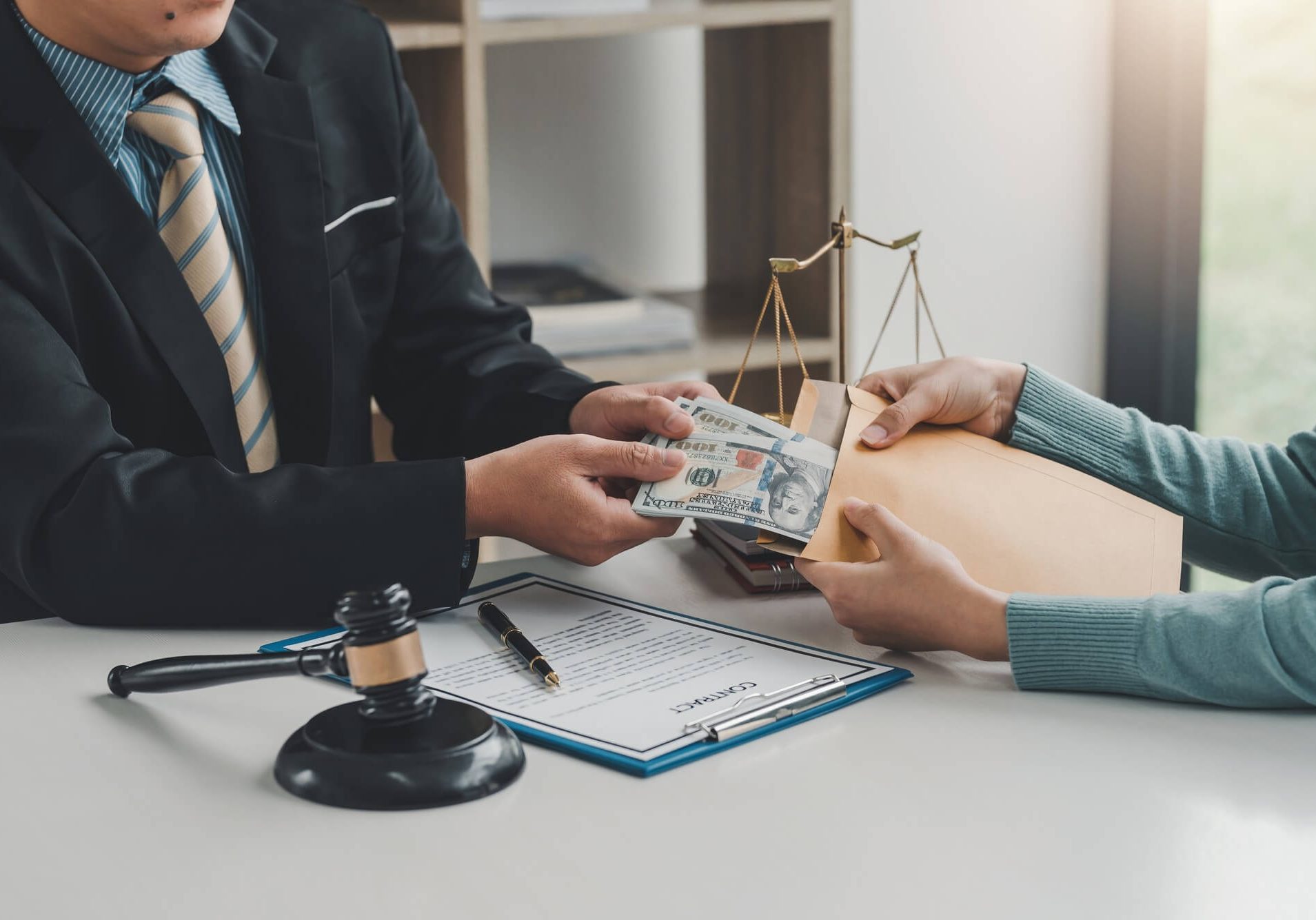 1031 exchange attorney reviewing real estate investment transaction documents