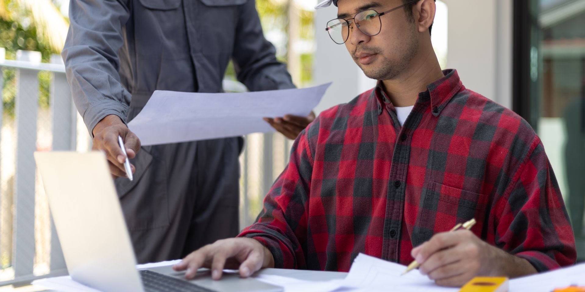 mechanics-lien-deadline-nevada Nevada contractor reviewing mechanics lien deadlines and construction payment records