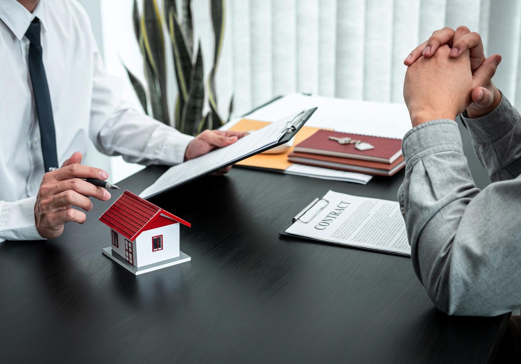 neighbor dispute lawyer reviewing property boundary conflict documents