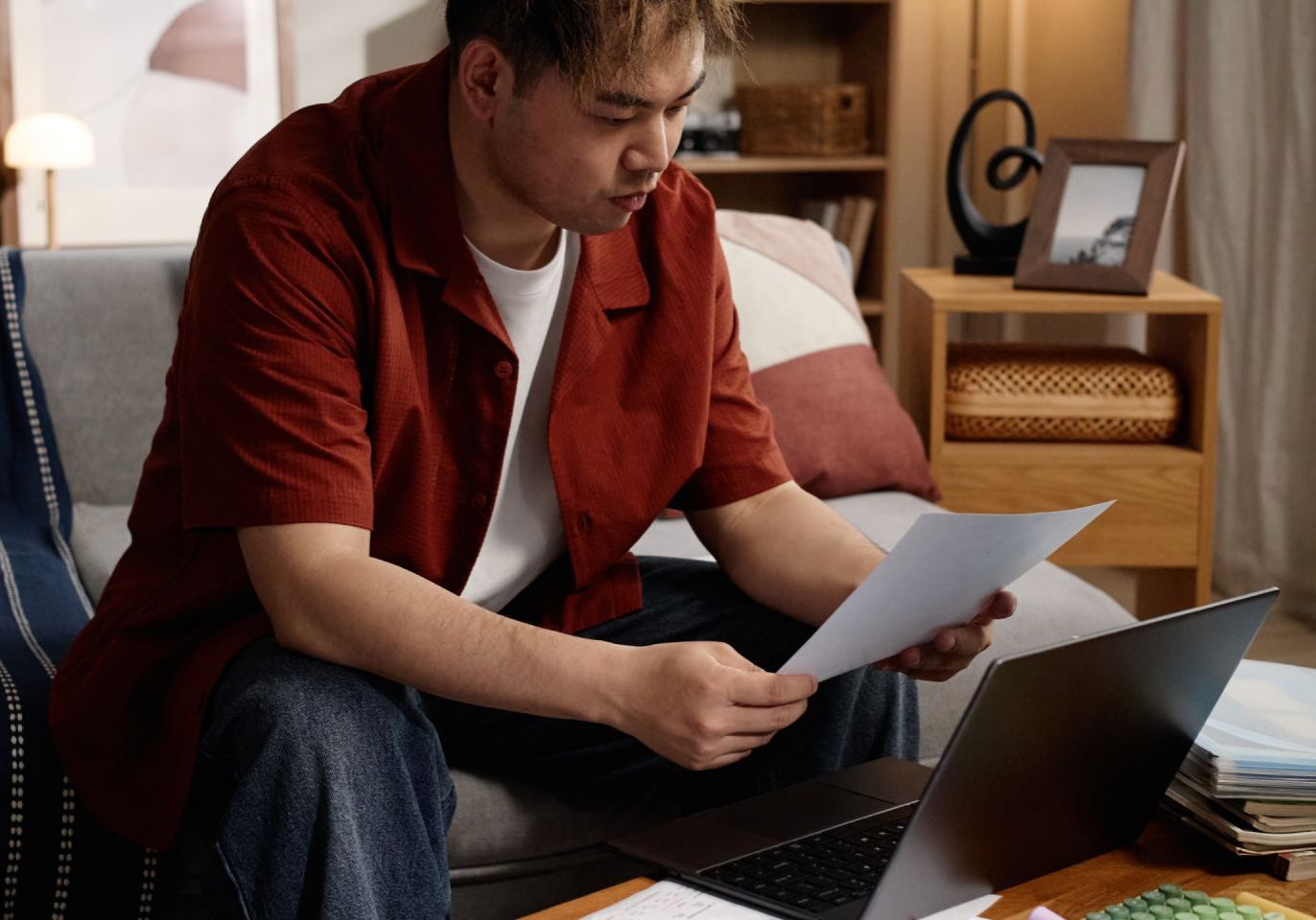 Nevada homeowner reviewing loan modification documents to avoid foreclosure