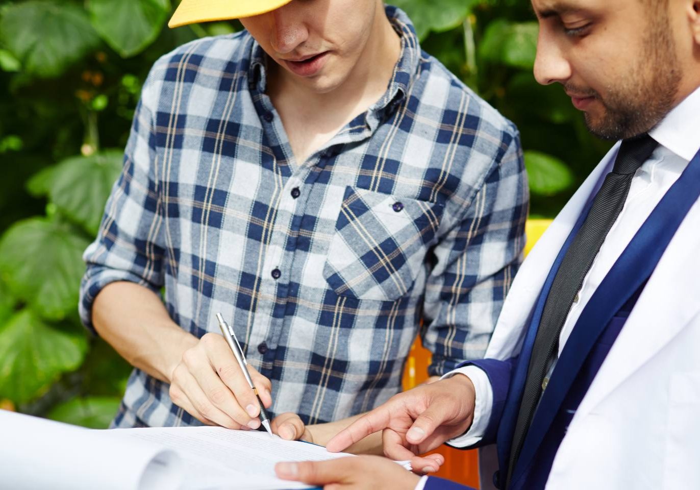 Nevada rural property owner reviewing water rights documents with a real estate attorney