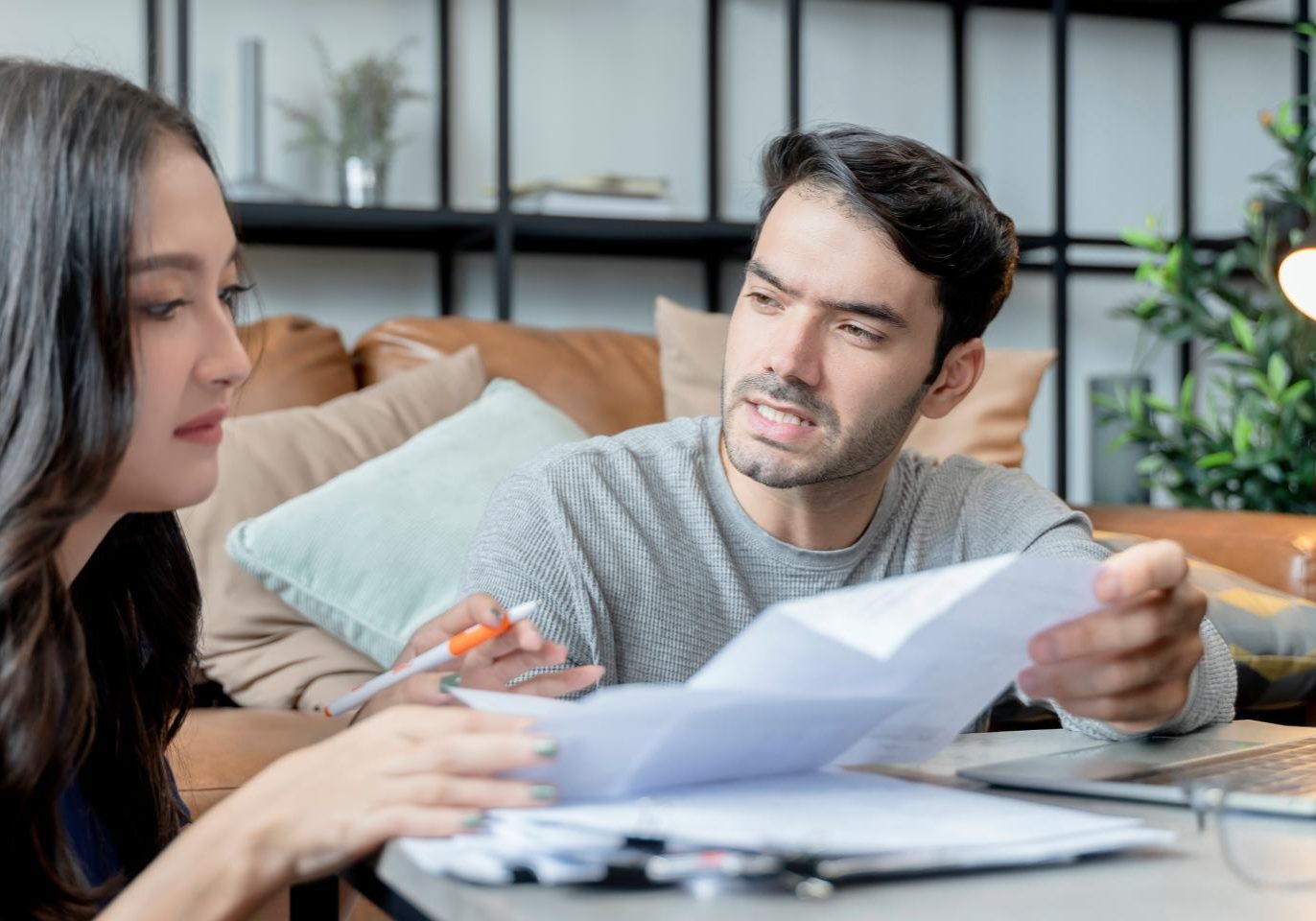Nevada homeowner reviewing a Notice of Default and foreclosure documents