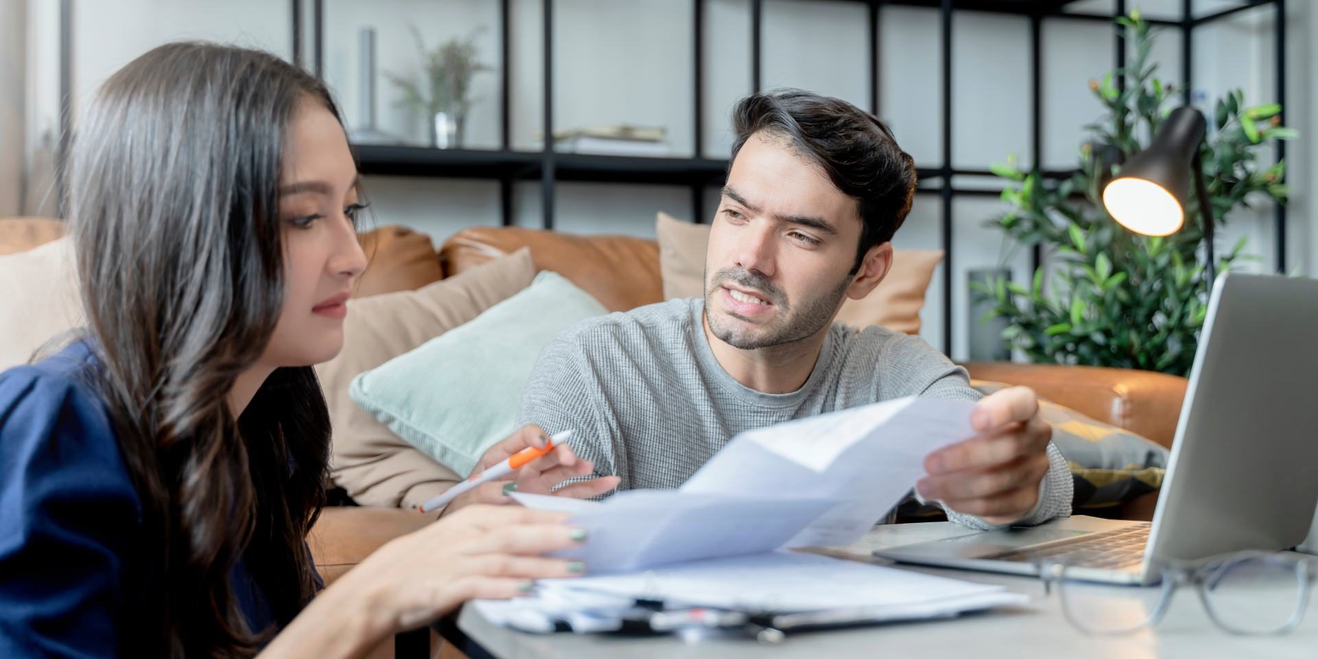 notice-of-default-nevada-what-to-do Nevada homeowner reviewing a Notice of Default and foreclosure documents
