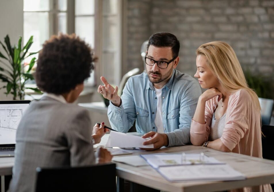 real estate lawyer reviewing a property deed with an owner whose property partner stopped cooperating, real estate lawyer