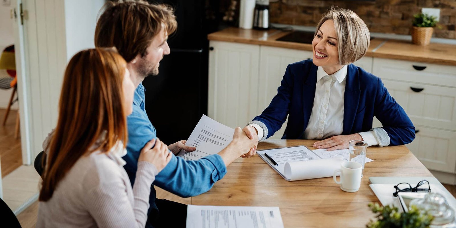 purchase and sale agreement attorney reviewing real estate contract documents