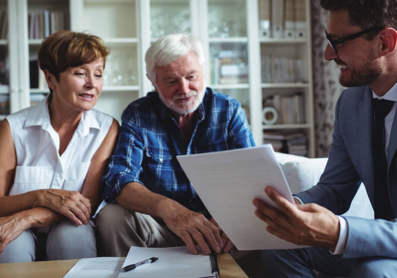 family reviewing a rent-to-own home agreement with a Nevada real estate attorney