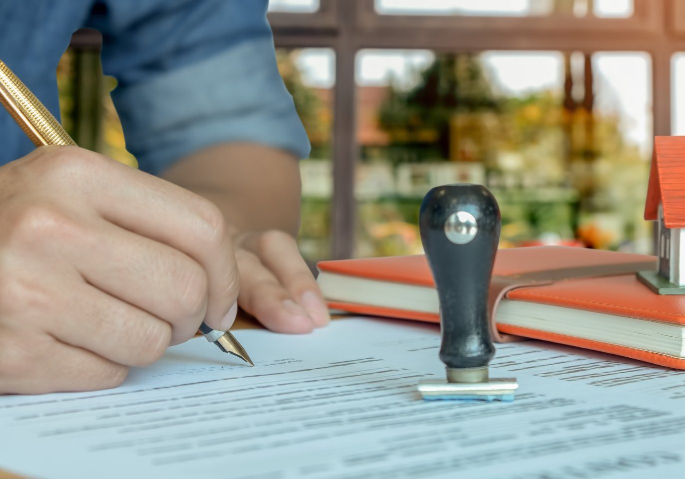 Title insurance policy and forged deed being reviewed for a Nevada property
